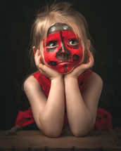 girl in a ladybug costume 