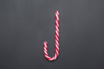 candy cane on a gray background 