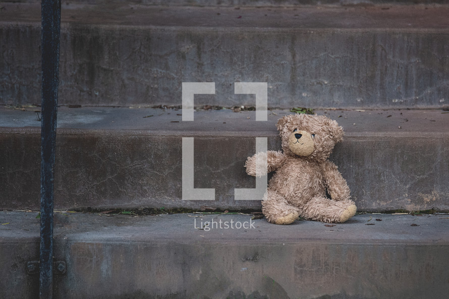 lost teddy bears on steps 