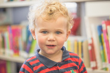 toddler boy  at the library 