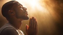 African American man in deep morning prayer