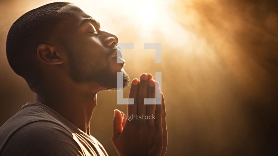 African American man in deep morning prayer
