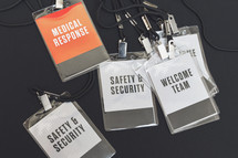 welcome team, medical response, and security badges 