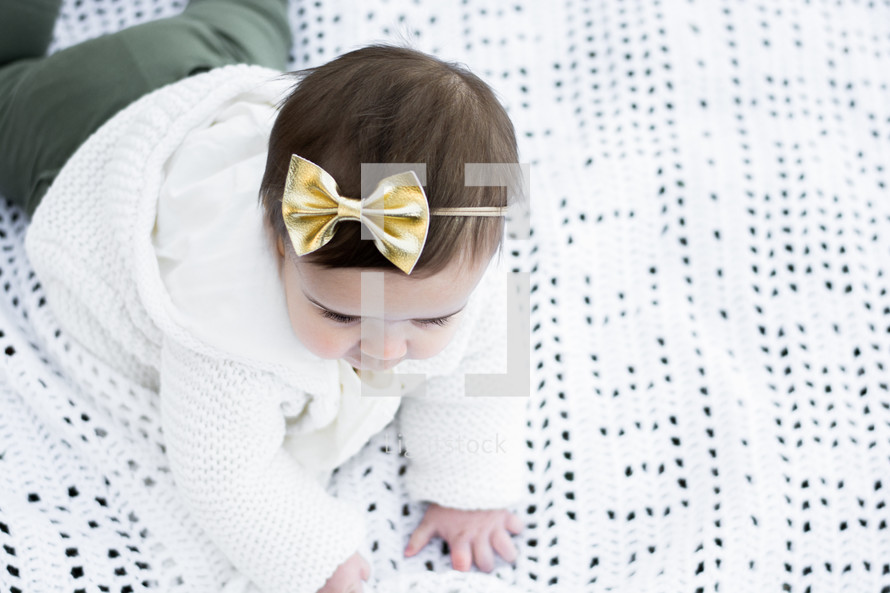 infant girl crawling 