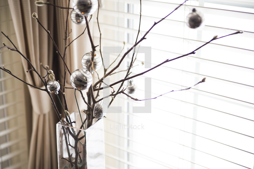 silver ornaments and branches 