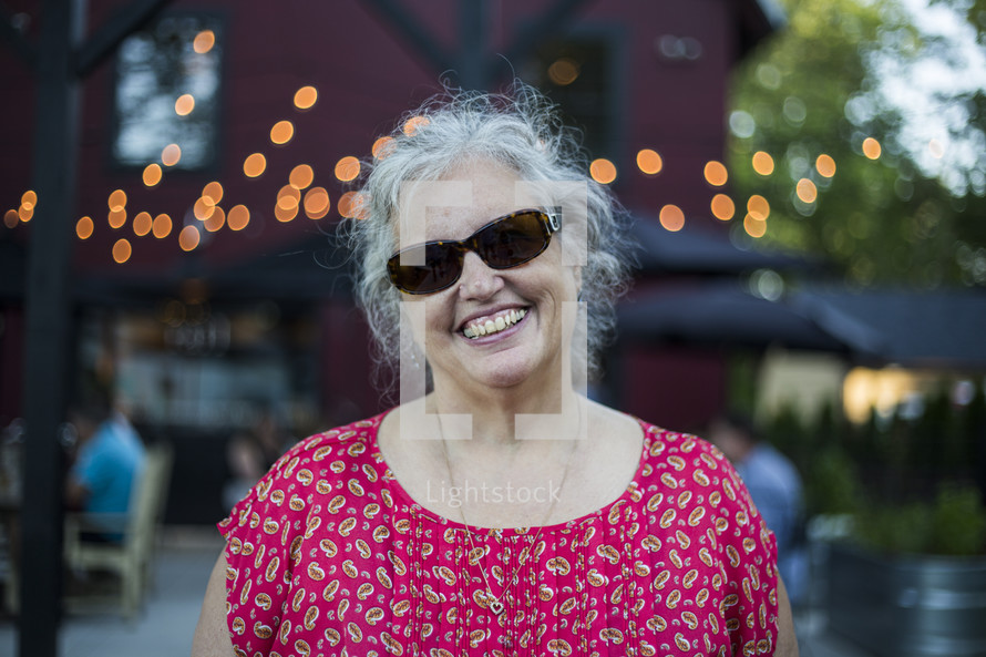 smiling woman in sunglasses 