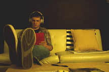 teenager listening to headphones