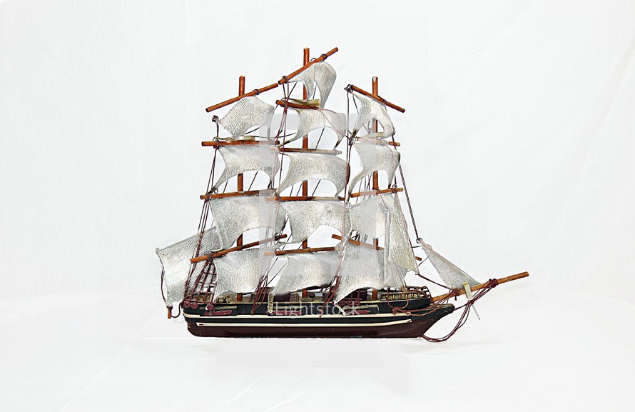 model ship against a white background 