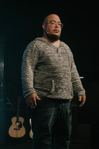 worship leader standing on stage 