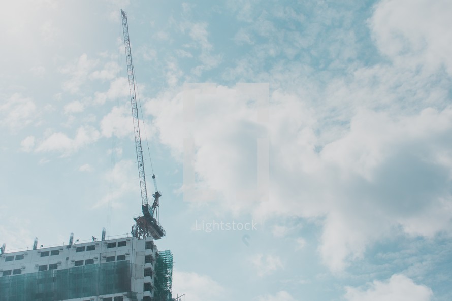 construction crane on top of a building 