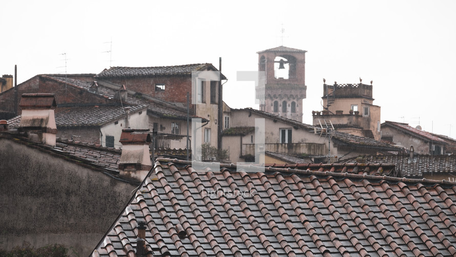 tile roof and distant bell tower 