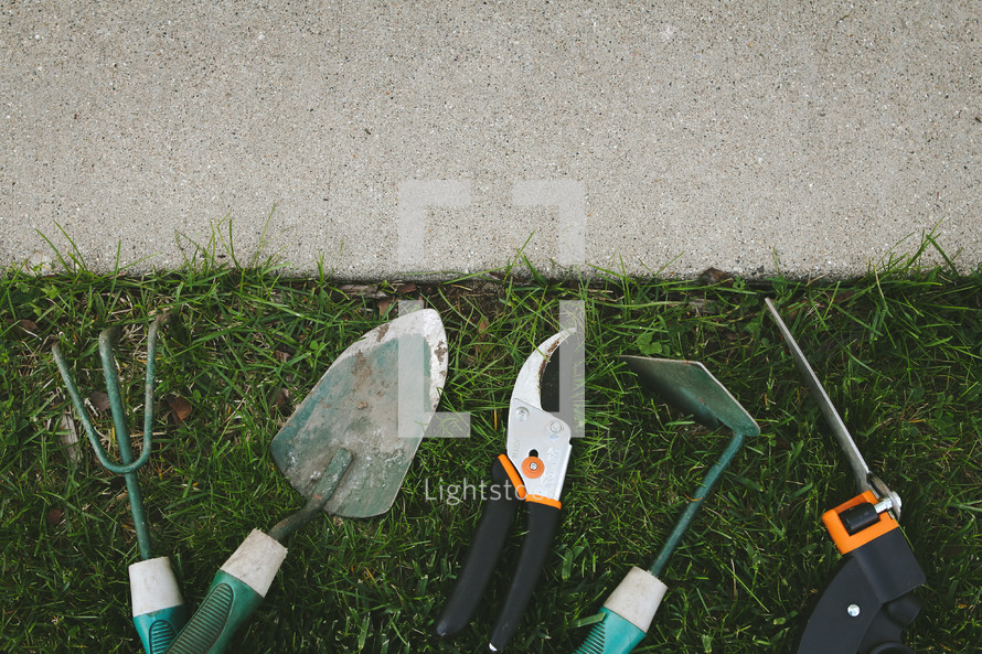 gardening tools in the grass