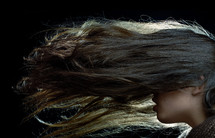 Studio shot of the woman with long hair
