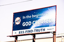 In the beginning God created. 855-FIND-TRUTH Genesis 1:1 billboard sign