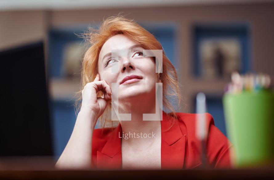 a woman at her desk working 
