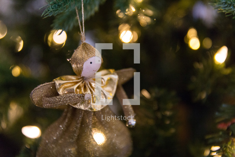 angel ornament on a Christmas tree 