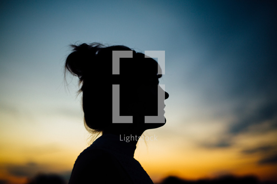 silhouette of a woman's side profile 