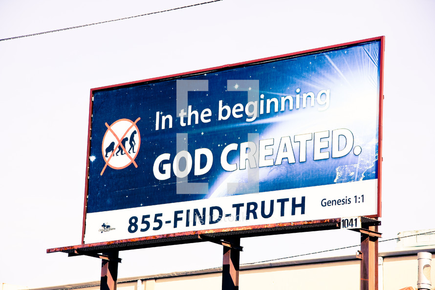 In the beginning God created. 855-FIND-TRUTH Genesis 1:1 billboard sign