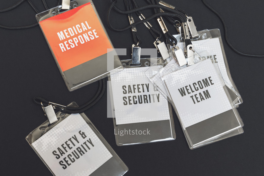 welcome team, medical response, and security badges 