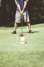 a man on the golf course 