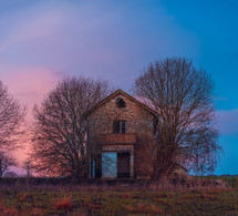 abandoned house at sunset 