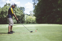 a man golfing 