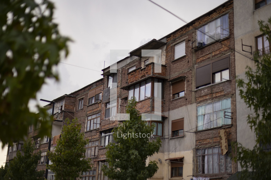 A rough looking apartment building in Eastern Europe