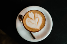 heart shape creamer in coffee 