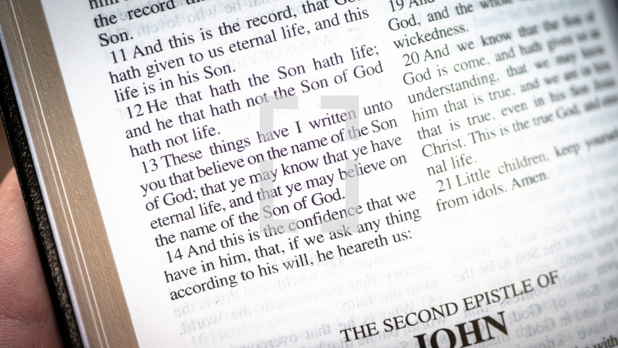 pages of a Bible - "These things have I written unto you that believe on the name of the Son of God; that ye may know that ye have eternal life, and that ye may believe on the name of the Son of God."