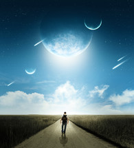 Boy walking down a road with planets and shooting stars in the sky.