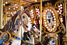 Carousel ponies racing endlessly to nowhere.