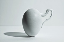 Abstract Egg and Shadow With Handle Of A  Cup