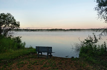 bench overlooking a lake 