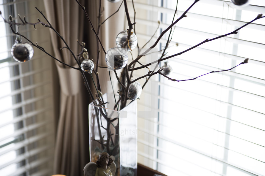 silver ornaments and branches 