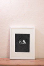 chalk word Ruth in a frame
