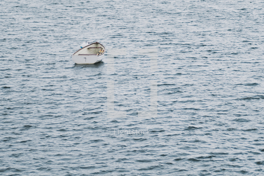 Empty boat on the ocean.