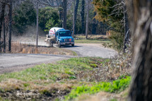 propane truck on a dirt road 