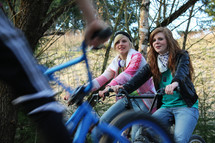 teen girls riding bikes