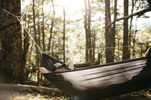 man resting in a hammock 
