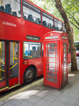 red double decker bus and phone booth in London