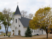 steeple on a rural white church 
