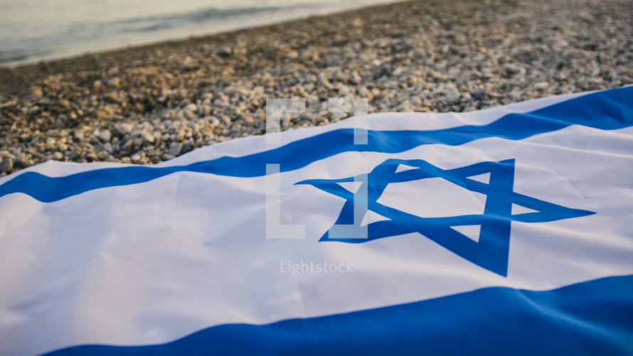 Flag of Israel outdoor on the beach