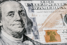 Close-up of a one hundred dollar bill.
