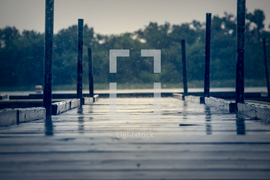 rain falling on a dock 