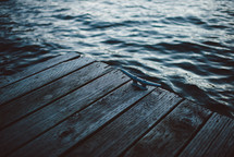 dock and choppy lake water 
