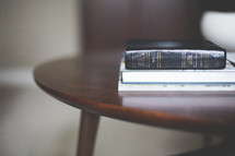 Bible on an end table 