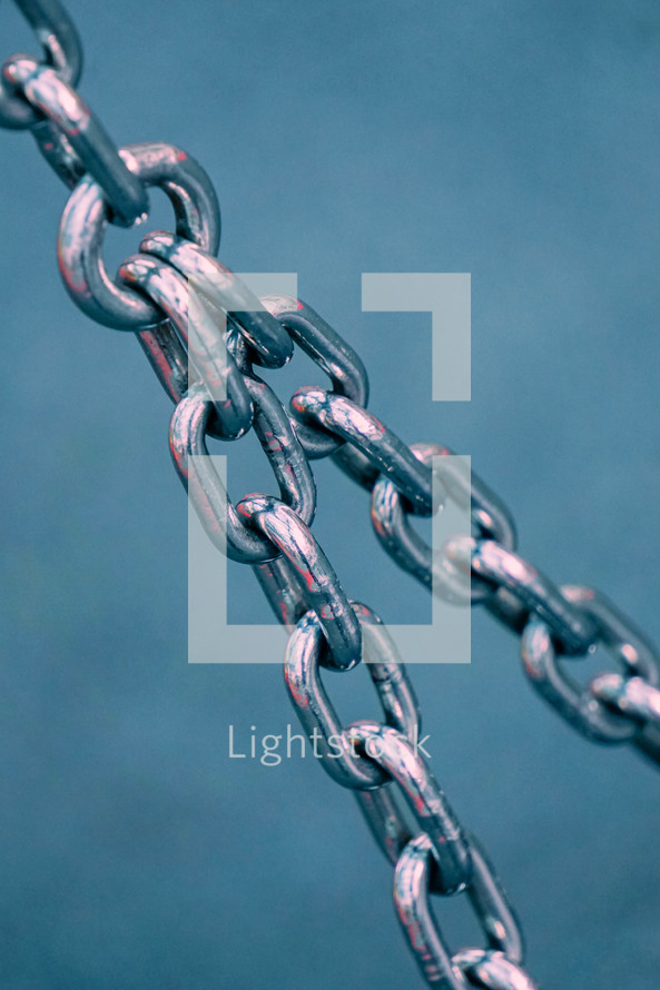 metallic chain and blue background