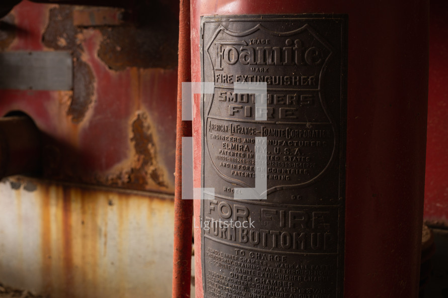 Vintage fire extinguisher on a truck