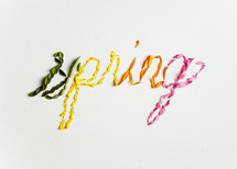 word spring in petals