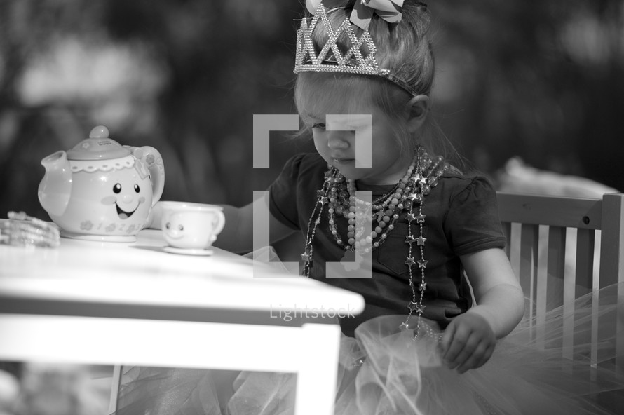 little girl having a princess tea party